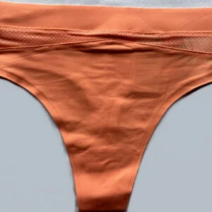 Dámská tanga Calvin Klein QF6047E meruňková